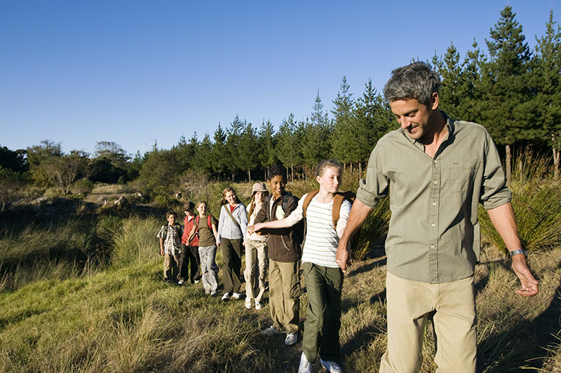Teacher and students hiking