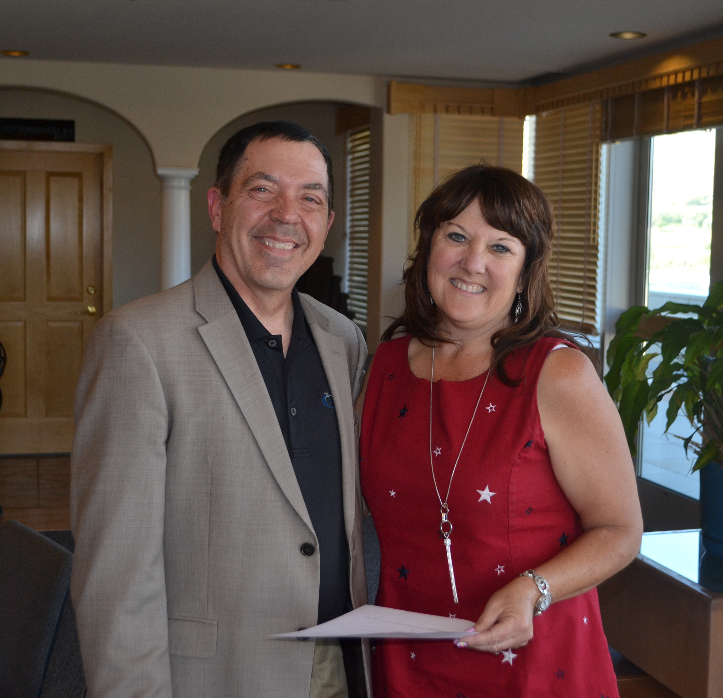 Rich McBride administered the Superintendent Oath of Office to Michelle Price